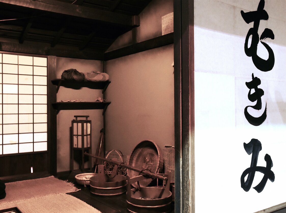 The clam seller’s yoke and baskets on display in a reconstructed room at the Fukagawa Edo Museum.