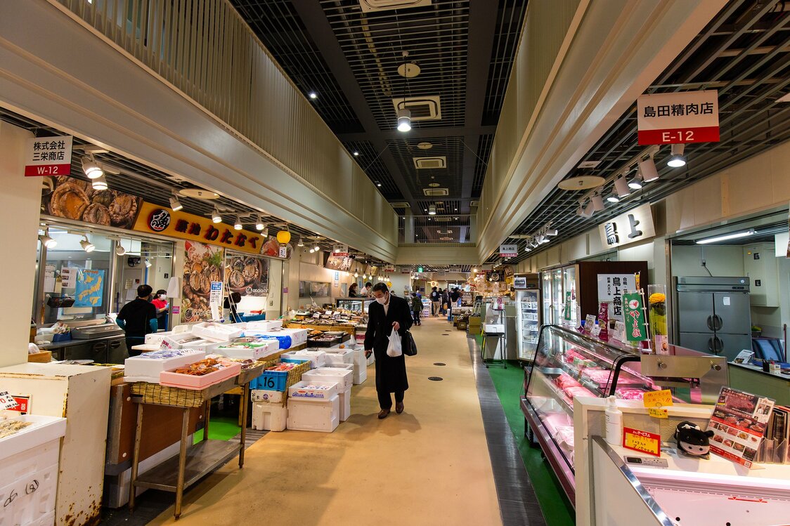 The shops offer a rich assortment of fresh seafood, meat, and fruits and vegetables.