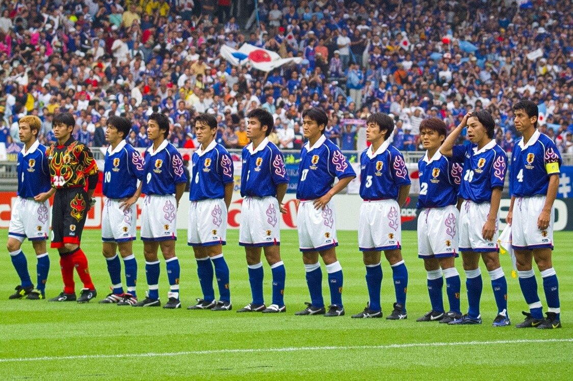 اليابان قبل مباراتها ضد جامايكا في كأس العالم 1998 في ليون، فرنسا، في 26 يونيو/ حزيران 1998. (© جيجي برس)