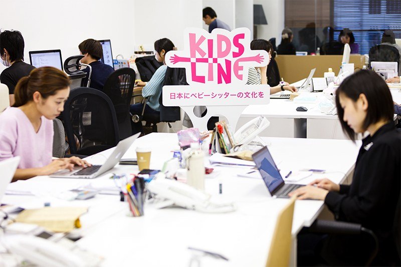 Equal numbers of men and women staff the Kidsline office in Roppongi, Tokyo.